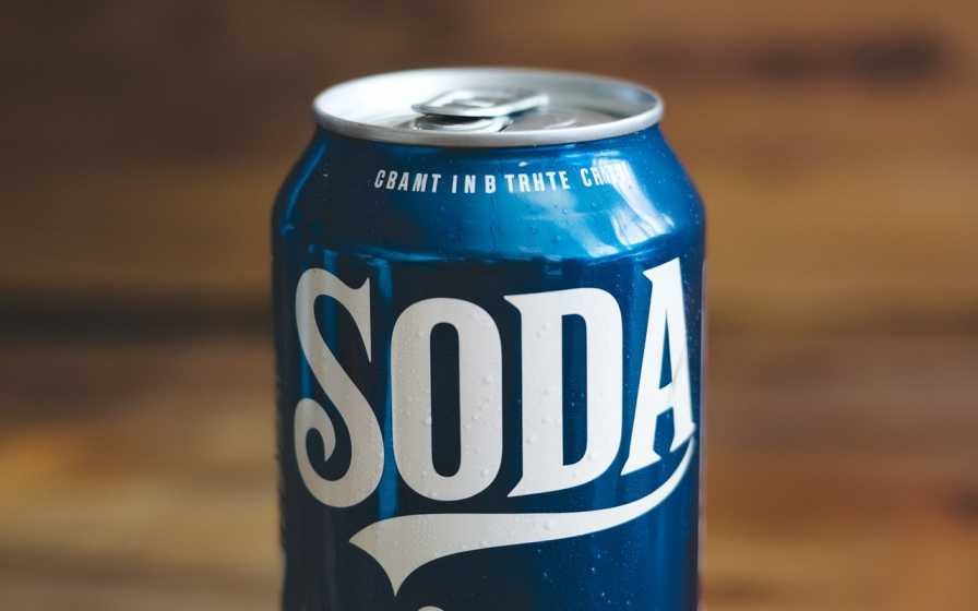 A Can of Soda showcasing the weight of 10 ounces (oz)