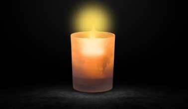 Small Candle in a Glass Jar showcasing the weight of 10 ounces